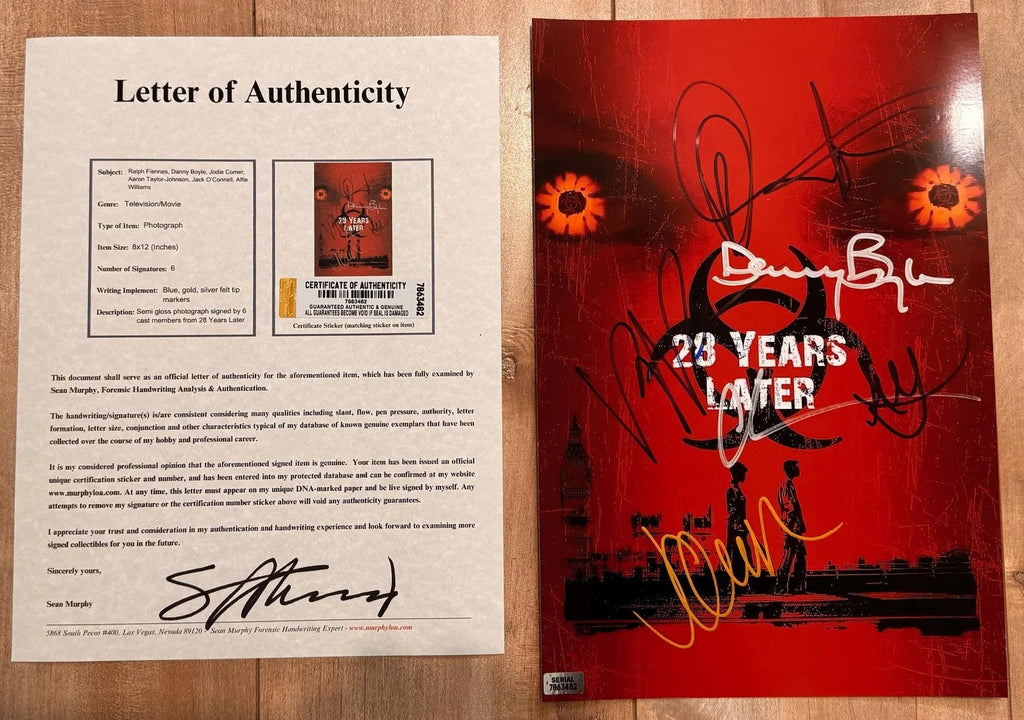 A cast autographed poster of the movie 28 Years Later. Signed photo of Jodie Comer, Ralph Fiennes, Aaron Taylor-Johnson, Jack O'Connell, Alfie Williams and Danny Boyle in silver gold and blue ink markers signatures. Photograph autographs for sale on 8x12 inch picture with COA.