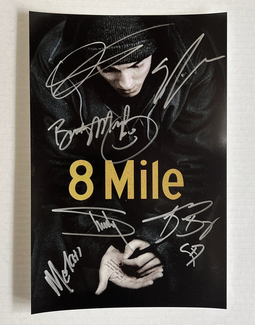 An autographed poster of movie 8 Mile. Signed photo of Eminem, Brittany Murphy, Kim Basinger, Mekhi Phifer, Evan Jones and Omar Benson Miller in silver ink marker signatures. Photograph autographs for sale on 8x12 inch picture.