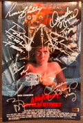 A cast autographed photo poster from the 1984 horror movie, A Nightmare on Elm Street. Signed photo of Robert Englund, Johnny Depp, Heather Langenkamp, ick Corri, Amanda Wydd, John Saxon, Ronee Blakley and Wes Craven in silver ink marker signatures. Photograph A Nightmare on Elm Street autographs for sale on 8x12 inch picture.