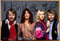 An autographed poster of the band, ABBA. Signed photo of Agnetha Faltskog, Bjorn Ulvaeus, Benny Andersson and Anni-Frid Lyngstad in black marker ink signatures. Photograph autographs for sale on 8x12 inch picture.