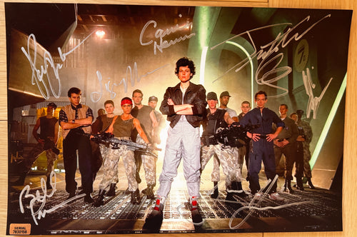 A cast autographed movie photo poster from the 1979 movie, Alien. Signed photo of Sigourney Weaver, Carrie Henn, Michael Biehn, Paul Reiser, Bill Paxton, Lance Henriksen and Jenette Goldstein in silver ink marker signatures. Photograph autographs for sale on 8x12 inch picture.