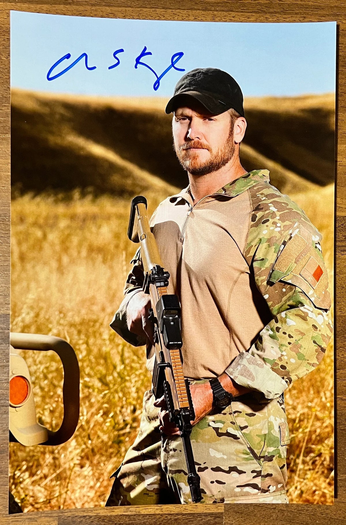 An autographed signed photo poster of american war hero, Chris S. Kyle. photograph autographs for sale. 8x12 inch picture. American Sniper photo.