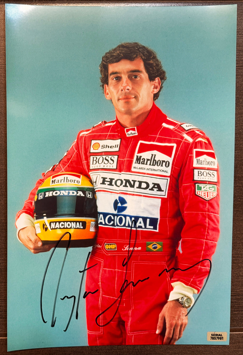An autographed poster of racing star, Ayrton Senna. Signed photo in black ink marker signatures. Photograph autographs for sale on 8x12 inch picture.