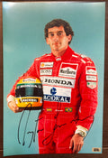 An autographed poster of racing star, Ayrton Senna. Signed photo in black ink marker signatures. Photograph autographs for sale on 8x12 inch picture.