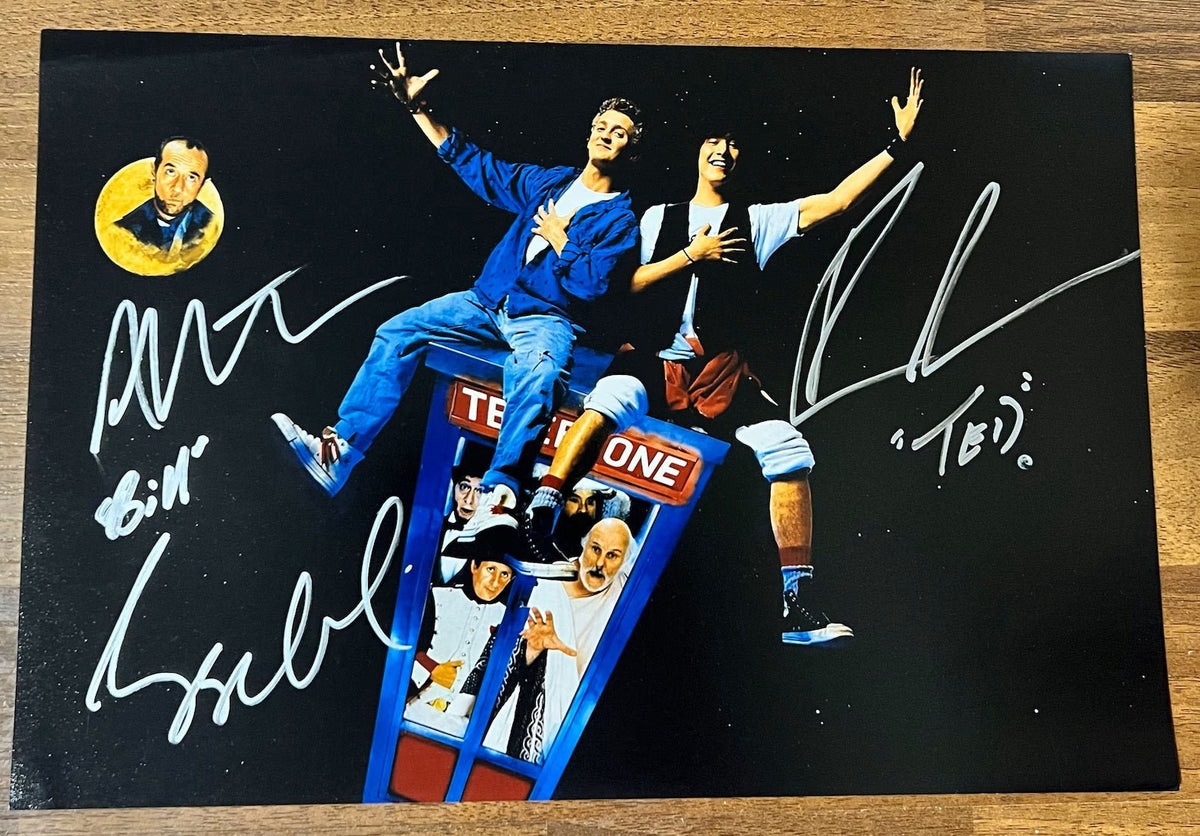 A cast autographed photo poster of the movie Bill and Ted's Excellent Adventure. Signed poster by Keanu Reeves, Alex Winter and George Carlin in silver ink markers signatures. photograph Keanu Reeves autographs for sale on 8x12 inch picture.