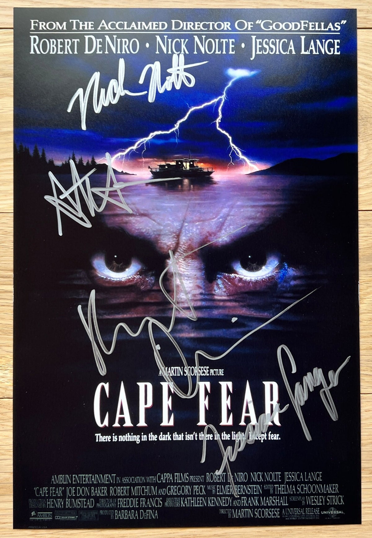 A cast autographed photo poster of the 1991 movie, Cape Fear. Signed photo of Robert De Niro, Nick Nolte, Juliette Lewis and Jessica Lange in silver ink marker signatures. Photograph autographs for sale on 8x12 inch picture.