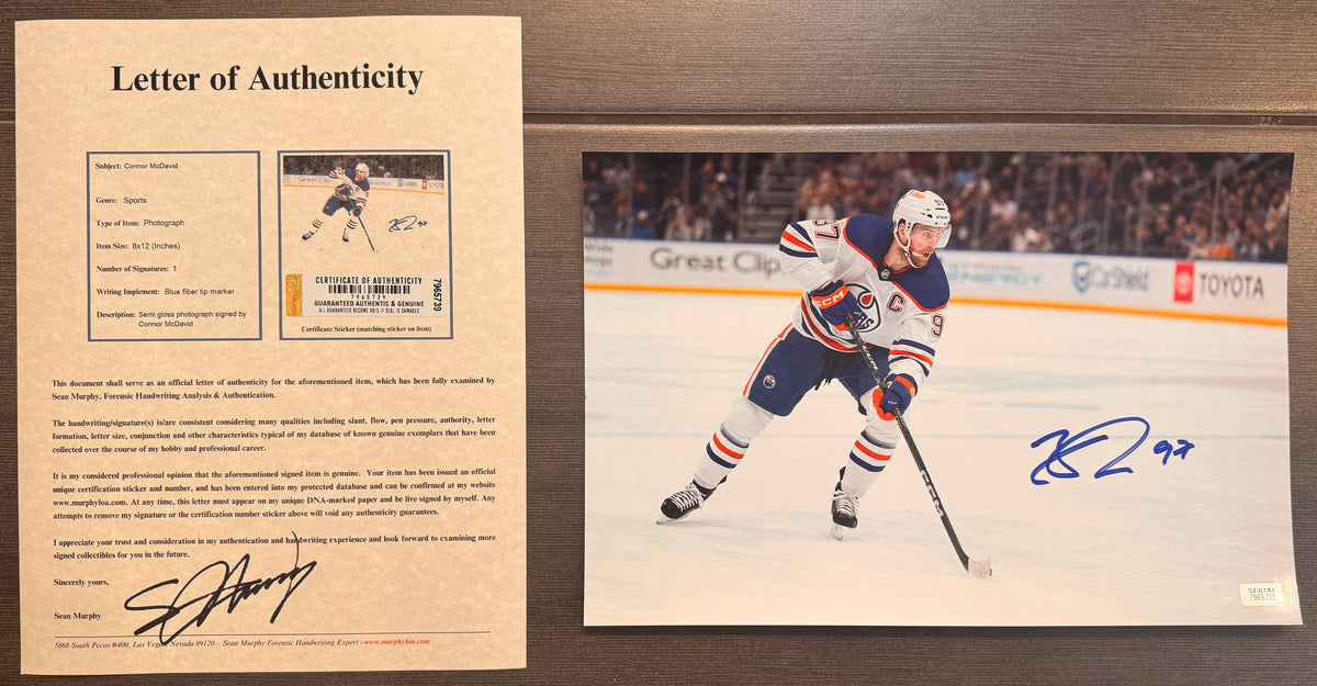 An autographed rookie auto photo poster of the NHL Edmonton Oilers hockey player, Connor McDavid. Signed photograph patch auto upper deck in blue ink marker signatures. Photograph Connor McDavid autographs for sale on 8x12 inch picture with COA.