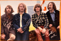 An autographed poster of the rock band Creedence Clearwater Revival also known as CCR. Signed photo of John Fogerty, Stu Cook and Doug Clifford in silver ink signatures. Photograph ccr autographs for sale on 8x12 inch picture.