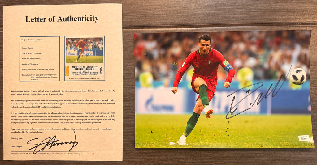 An autographed auto rookie rc patch auto photo poster of European Football soccer player, Cristiano Ronaldo. Signed photograph in black ink marker signatures. Photograph Cristiano Ronaldo autographs for sale on 8x12 inch picture with COA.