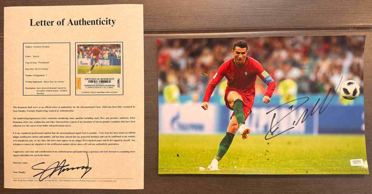 An autographed auto rookie rc patch auto photo poster of European Football soccer player, Cristiano Ronaldo. Signed photograph in black ink marker signatures. Photograph Cristiano Ronaldo autographs for sale on 8x12 inch picture with COA.