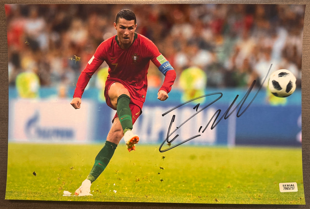 An autographed auto rookie rc patch auto photo poster of European Football soccer player, Cristiano Ronaldo. Signed photograph in black ink marker signatures. Photograph Cristiano Ronaldo autographs for sale on 8x12 inch picture.