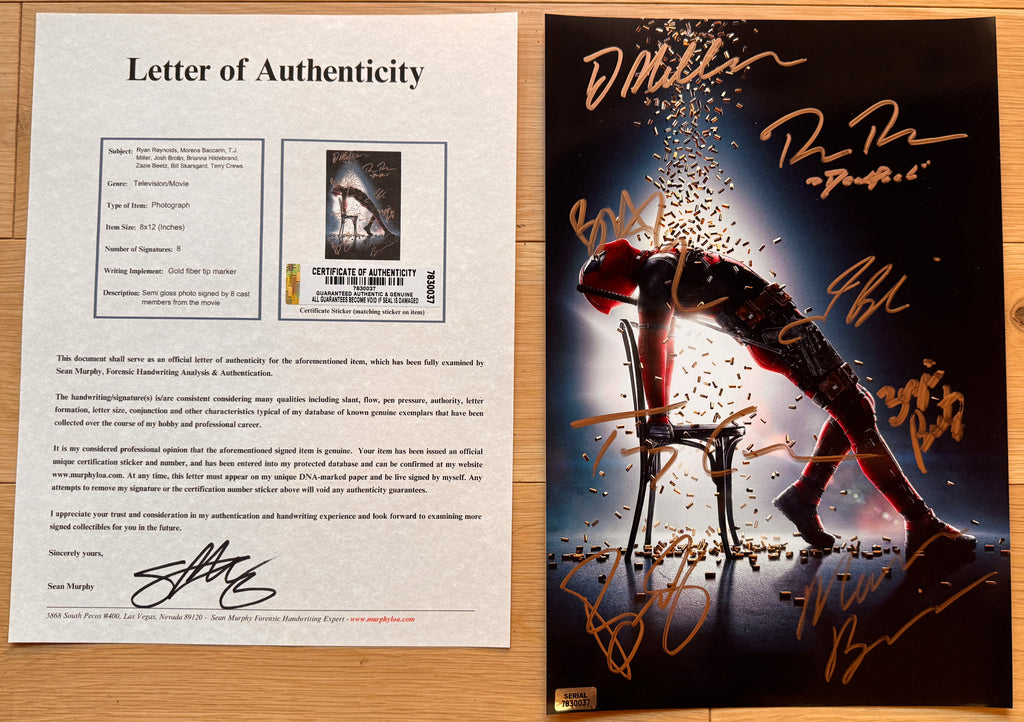 A cast autographed poster of the super hero movie Deadpool. Signed photo of Ryan Reynolds, Morena Baccarin, T.J. Miller, Josh Brolin, Brianna Hildebrand, Zazie Beetz, Bill Skarsgard and Terry Crews in gold ink marker signatures. Photograph autographs for sale on 8x12 inch picture with COA.