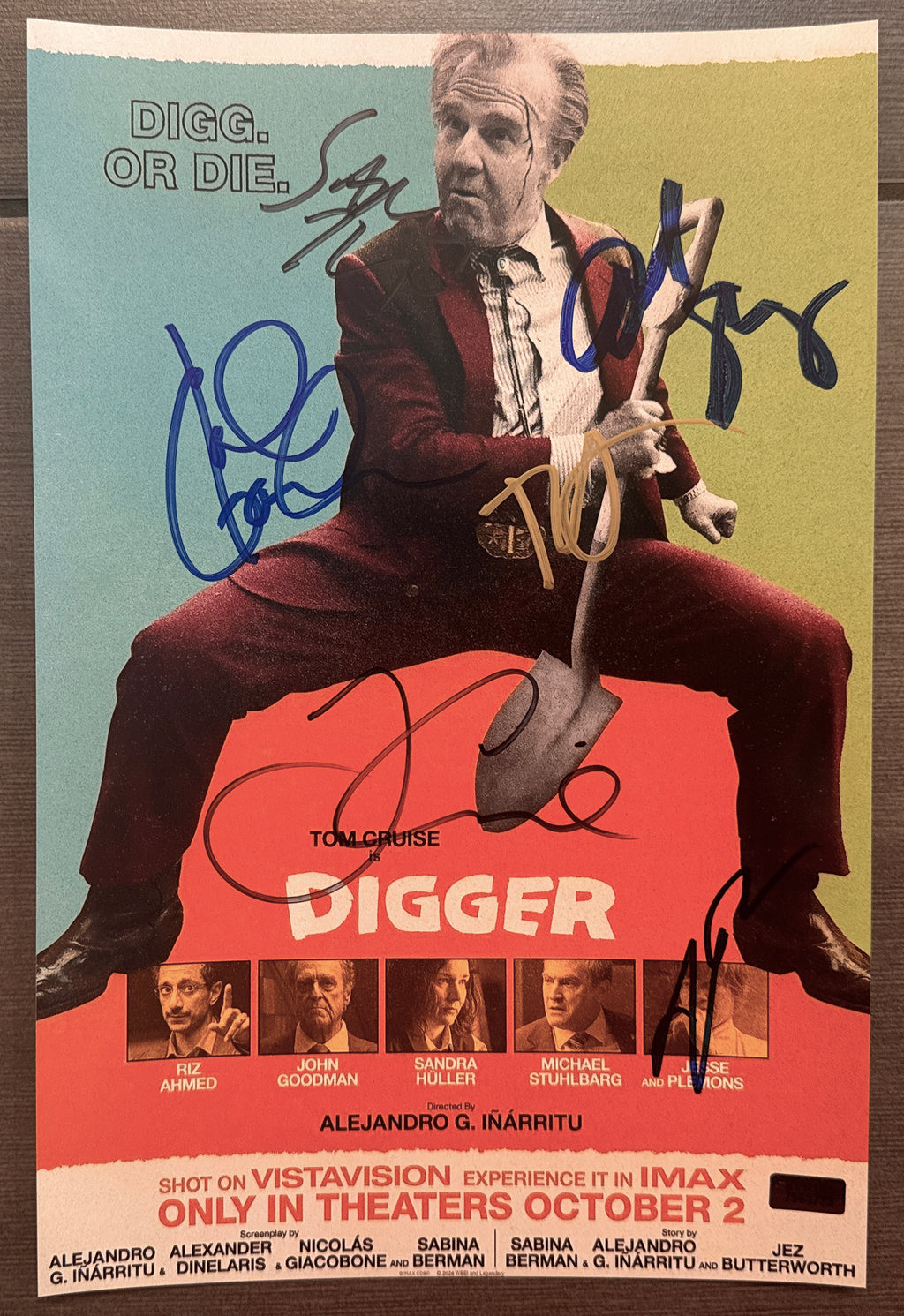 A cast autographed photo poster of the 2026 movie, DIGGER. Signed photograph of Tom Cruise, John Goodman, Riz Ahmed, Michael Stuhlbarg, Sandra Huller and Jesse Plemons in black, silver, blue ink marker signatures. Photograph Digger autographs for sale on 8x12 inch picture.