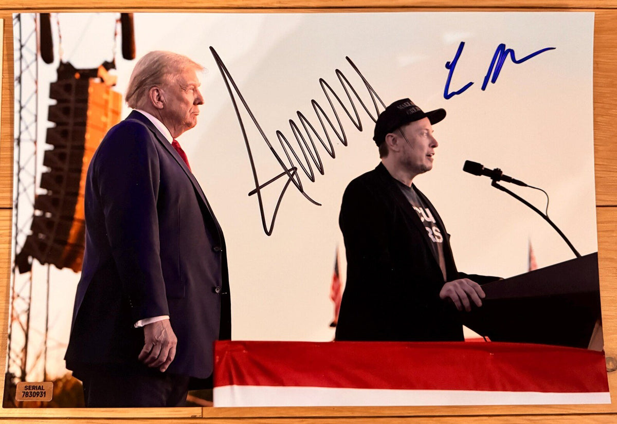 A dual autographed photo poster of The President of the United States of America, Donald Trump and Tesla SpaceX CEO, Elon Musk. Dual signed photo of Donald Trump and Elon Musk in black and blue ink markers signatures. Photograph autographs for sale on 8x12 inch picture.