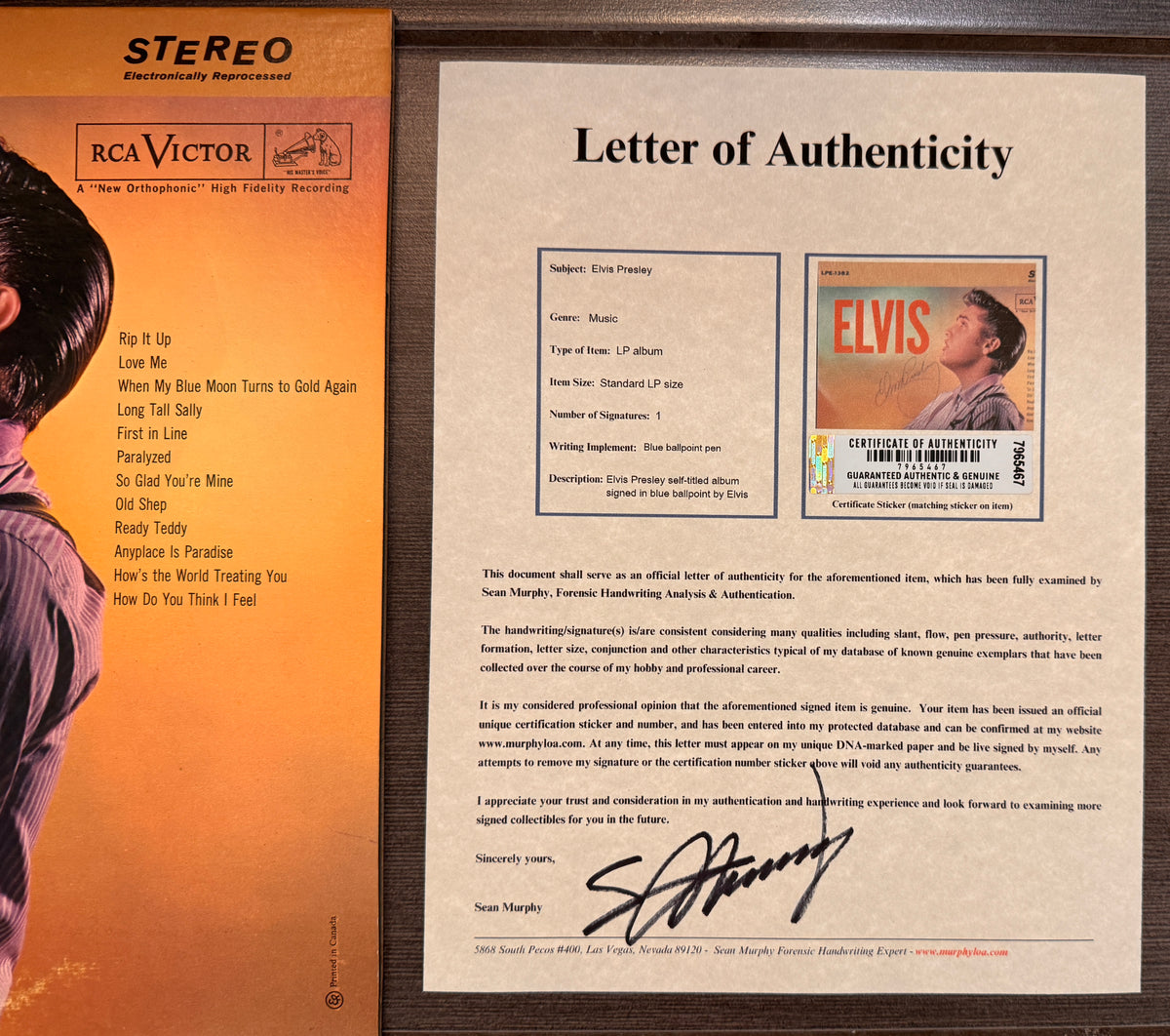 an autographed self-titled record album LP of Elvis Presley. signed in blue ink on the front cover. autograph in mint condition with certificate of authenticity with COA.