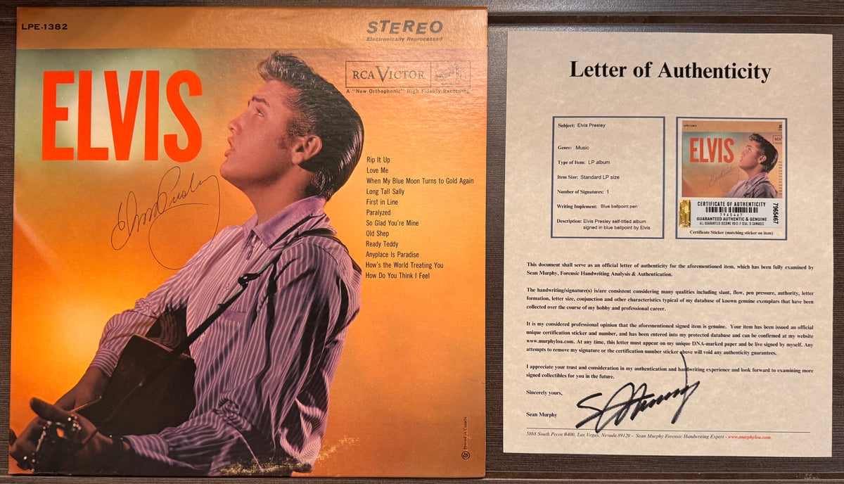 an autographed self-titled record album LP of Elvis Presley. signed in blue ink on the front cover. autograph in mint condition with certificate of authenticity with COA.