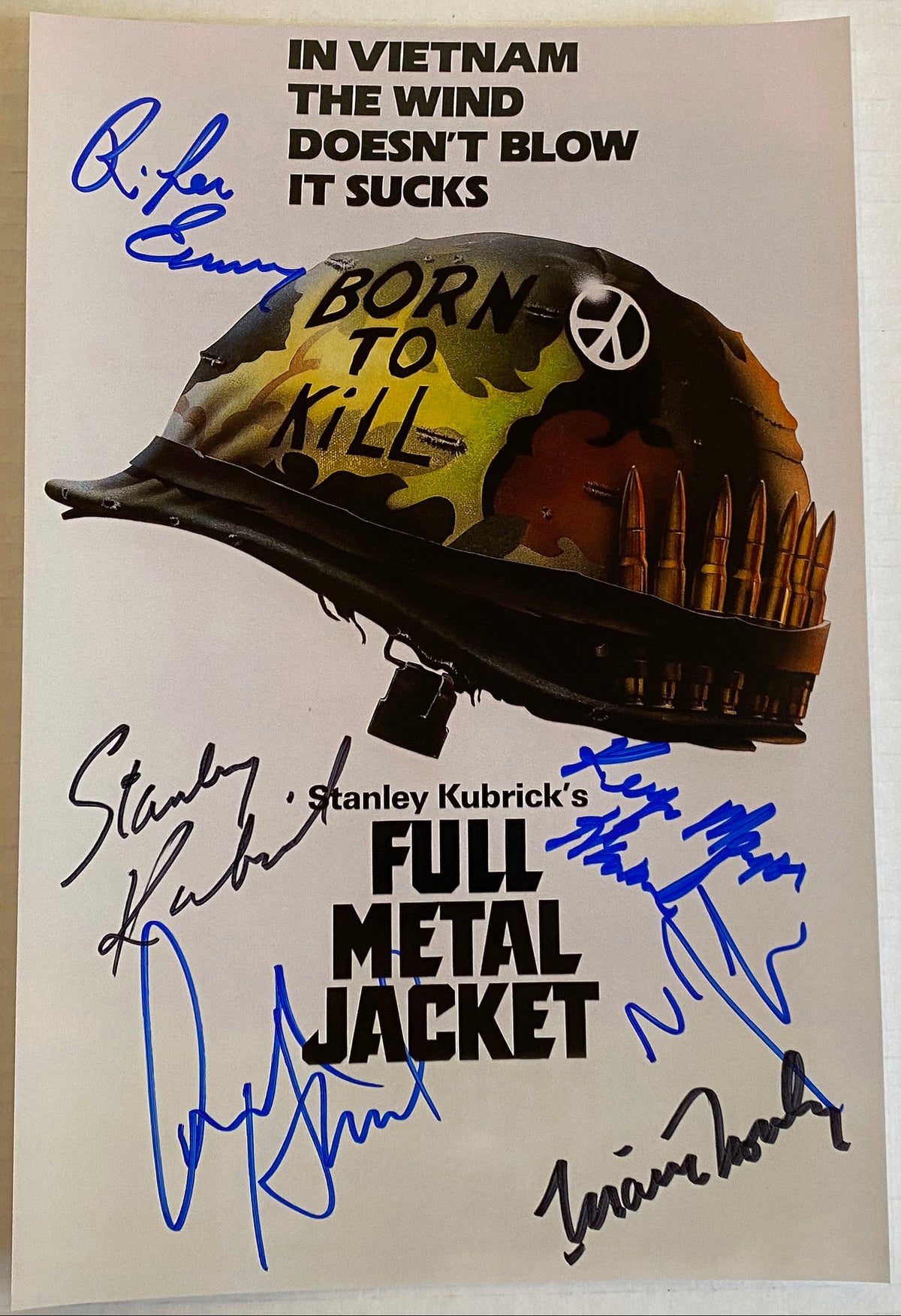 A cast signed collectible poster of Stanley Kubrick's film 'Full Metal Jacket'. Signed photo of Stanley Kubrick, Matthew Modine, R. Lee Ermey, Vincent D'Onofrio, Kevyn Major Howard and Arliss Howard in blue and black ink markers signatures. Photograph Full Metal Jacket autographs for sale on 8x12 inch picture.