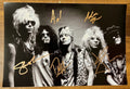 An autographed poster of the heavy metal band, Guns N Roses. Signed photo of Axl Rose, Slash, Duff McKagan, Izzy Stradlin and Steven Adler in gold ink marker signatures. Photograph autographs for sale on 8x12 inch picture.