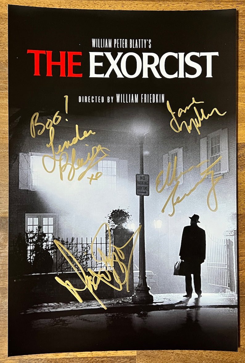 A cast autographed poster of the horror movie, The Exorcist. Signed photo of Linda Blair, Ellen Burstyn, Max Von Sydow and Jason Miller in gold ink marker signatures. Photograph autographs for sale on 8x12 inch picture.