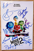 An autographed poster of the movie Inside Out 2, signed photo by actors Amy Poehler, Phyllis Smith, Lewis Black, Tony Hale, Liza Lapria, Maya Hawke, Ayo Edebiri and Paul Walter Houser in blue ink signatures. autograph signed on 8x12 inch photograph photo Inside Out 2 autographs for sale.
