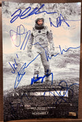 A cast autographed poster of the movie Interstellar. Signed photo of Matthew McConaughey, Anne Hathaway, Jessica Chastain, Christopher Nolan, Matt Damon, Mackenzie Foy, Wes Bentley and John Lithgow in blue ink marker signatures. Photograph autographs for sale on 8x12 inch picture.