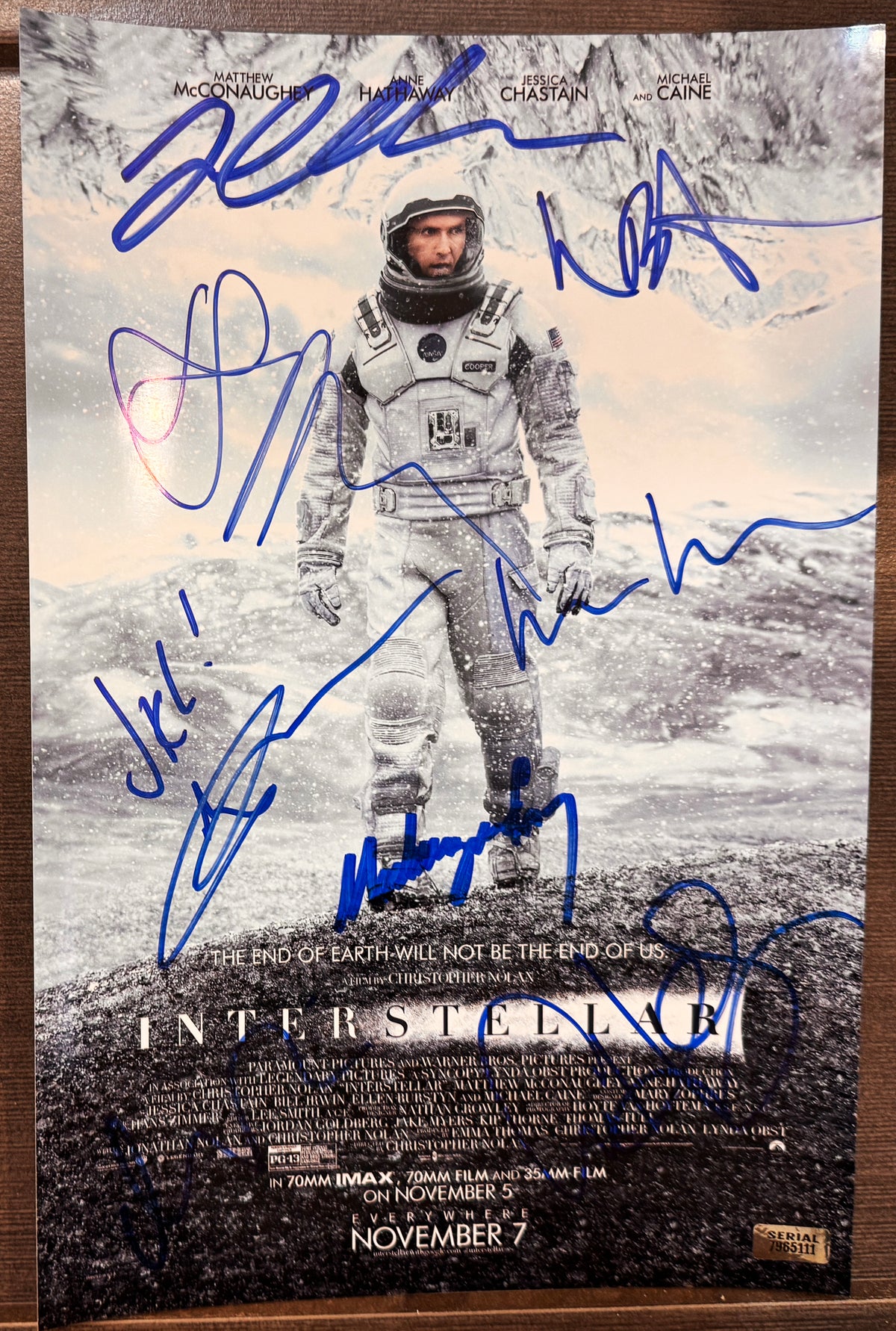 A cast autographed poster of the movie Interstellar. Signed photo of Matthew McConaughey, Anne Hathaway, Jessica Chastain, Christopher Nolan, Matt Damon, Mackenzie Foy, Wes Bentley and John Lithgow in blue ink marker signatures. Photograph autographs for sale on 8x12 inch picture.
