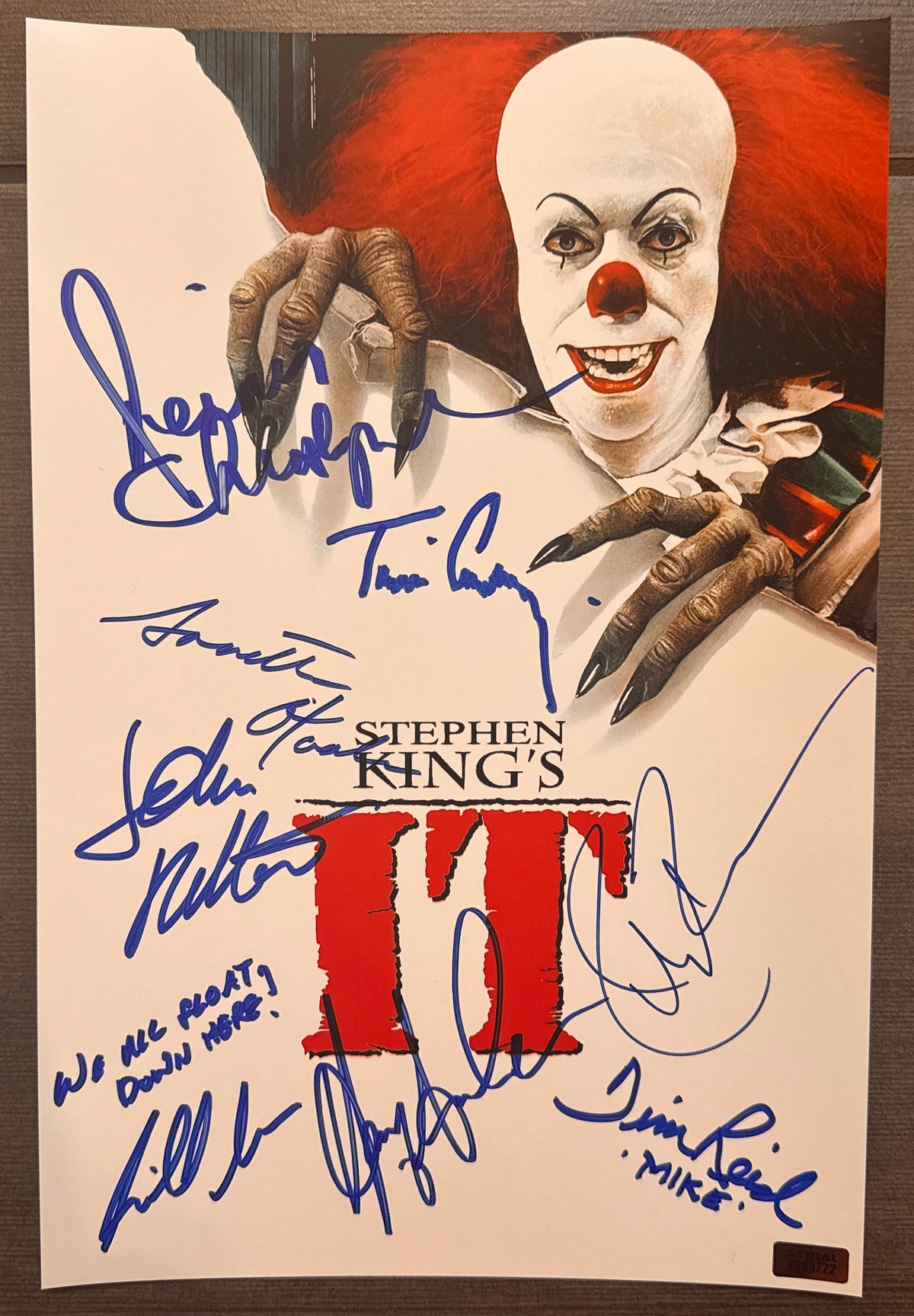 A cast autographed photo poster of the 1990 horror series, IT featuring pennywise the clown. Signed photograph of Tim Curry, Richard Thomas, John Ritter, Tim Reid, Annette O'Toole, Harry Anderson, Dennis Christopher and Richard Masur in blue ink marker signatures. Photograph Tim Curry it autographs for sale on 8x12 inch picture.