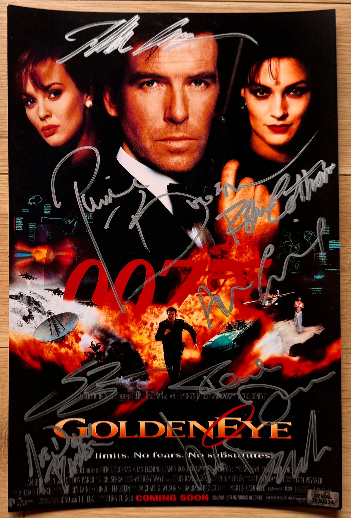 A cast autographed poster from the James Bond movie, 007 Goldeneye. Signed photo of Pierce Brosnan, Sean Bean, Izabella Scorupco, Famke Janssen, Joe Don Baker, Judi Dench, Robbie Coltrane and Alan Cumming in silver ink marker signatures. Photographs goldeneye autographs for sale on 8x12 inch picture.