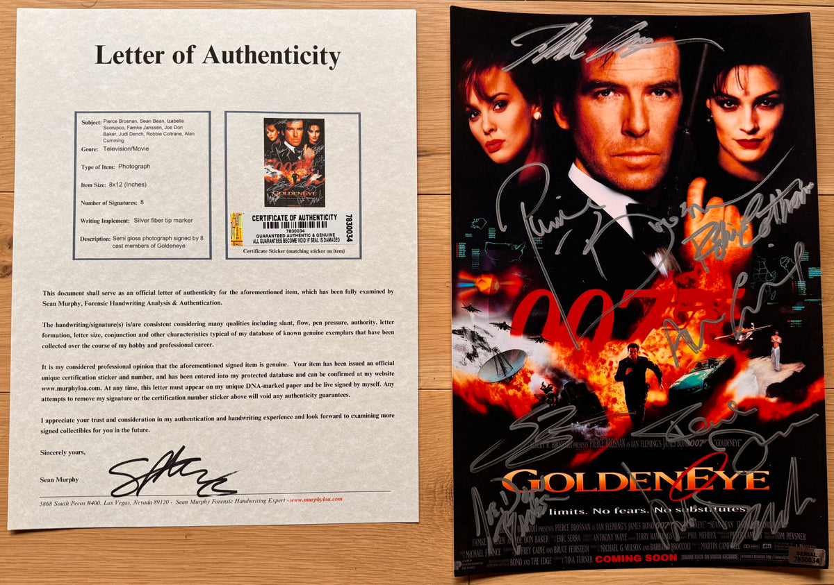 A cast autographed poster from the James Bond movie, 007 Goldeneye. Signed photo of Pierce Brosnan, Sean Bean, Izabella Scorupco, Famke Janssen, Joe Don Baker, Judi Dench, Robbie Coltrane and Alan Cumming in silver ink marker signatures. Photographs goldeneye autographs for sale on 8x12 inch picture with COA.