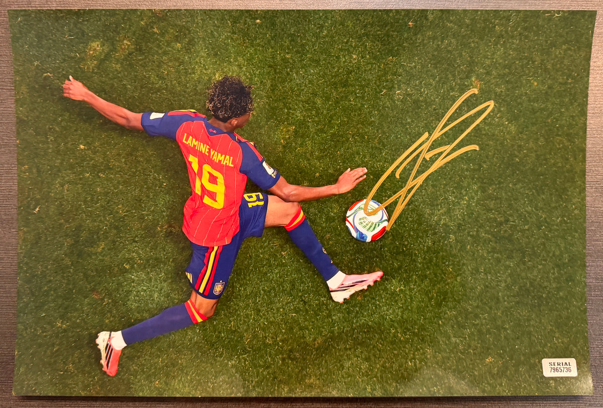 An autographed rc rookie patch auto photo poster of FIFA Barcelona Spain soccer european football player, Lamine Yamal. Signed photo in gold ink marker signatures. Photograph Lamine Yamal autographs for sale on 8x12 inch picture.