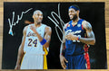 A dual auto autographed poster of NBA basketball players Lebron James and Kobe Bryant. Signed photo in silver ink marker signatures. Photograph Lebron James autographs for sale on 8x12 inch picture. 