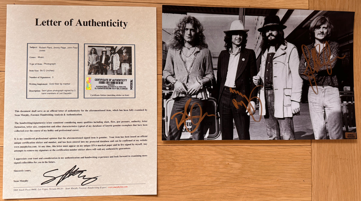 A signed poster of the rock band, Led Zeppelin. Signed photo of Robert Plant, Jimmy Page and John Paul Jones in gold ink marker signatures. Photograph autographs for sale on 8x12 inch picture with COA.