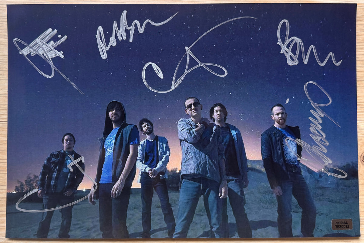An autographed poster of the band Linkin Park. signed photo of Chester Bennington, Rob Bourdon, Brad Delson, Mike Shinoda, Dave Farrell and Joe Hahn in silver ink marker signatures. photograph autographs for sale on 8x12 inch picture.