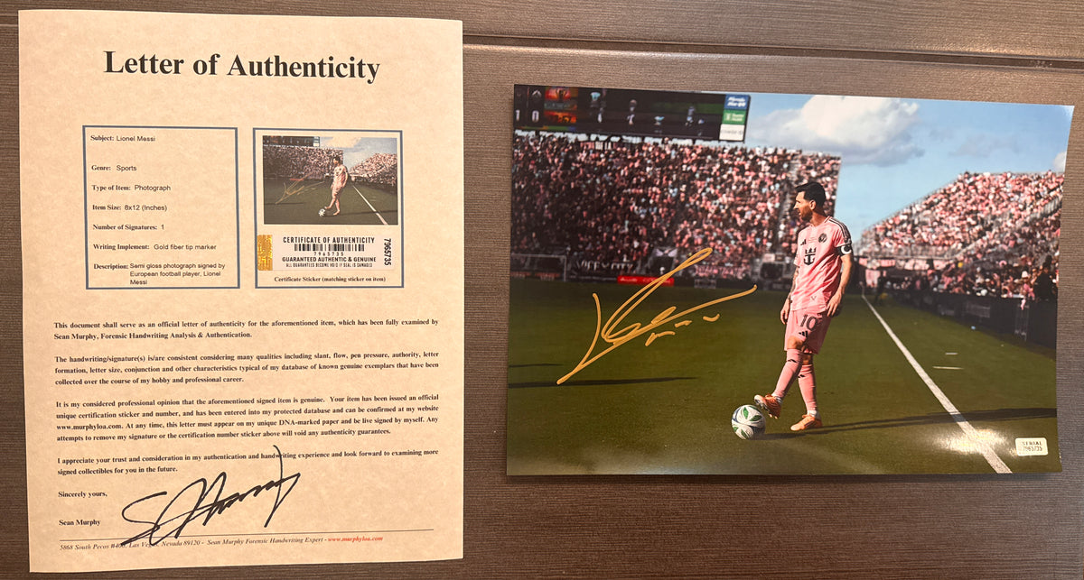 An autographed photo poster of FIFA soccer footballer player, Lionel Messi. Signed rookie auto patch photograph in old ink marker signatures. Photograph Lionel Messi autographs for sale on 8x12 inch picture with COA.
