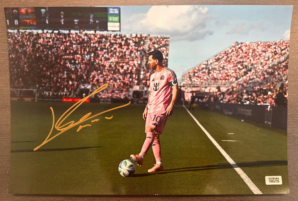 An autographed photo poster of FIFA soccer footballer player, Lionel Messi. Signed rookie auto patch photograph in old ink marker signatures. Photograph Lionel Messi autographs for sale on 8x12 inch picture.