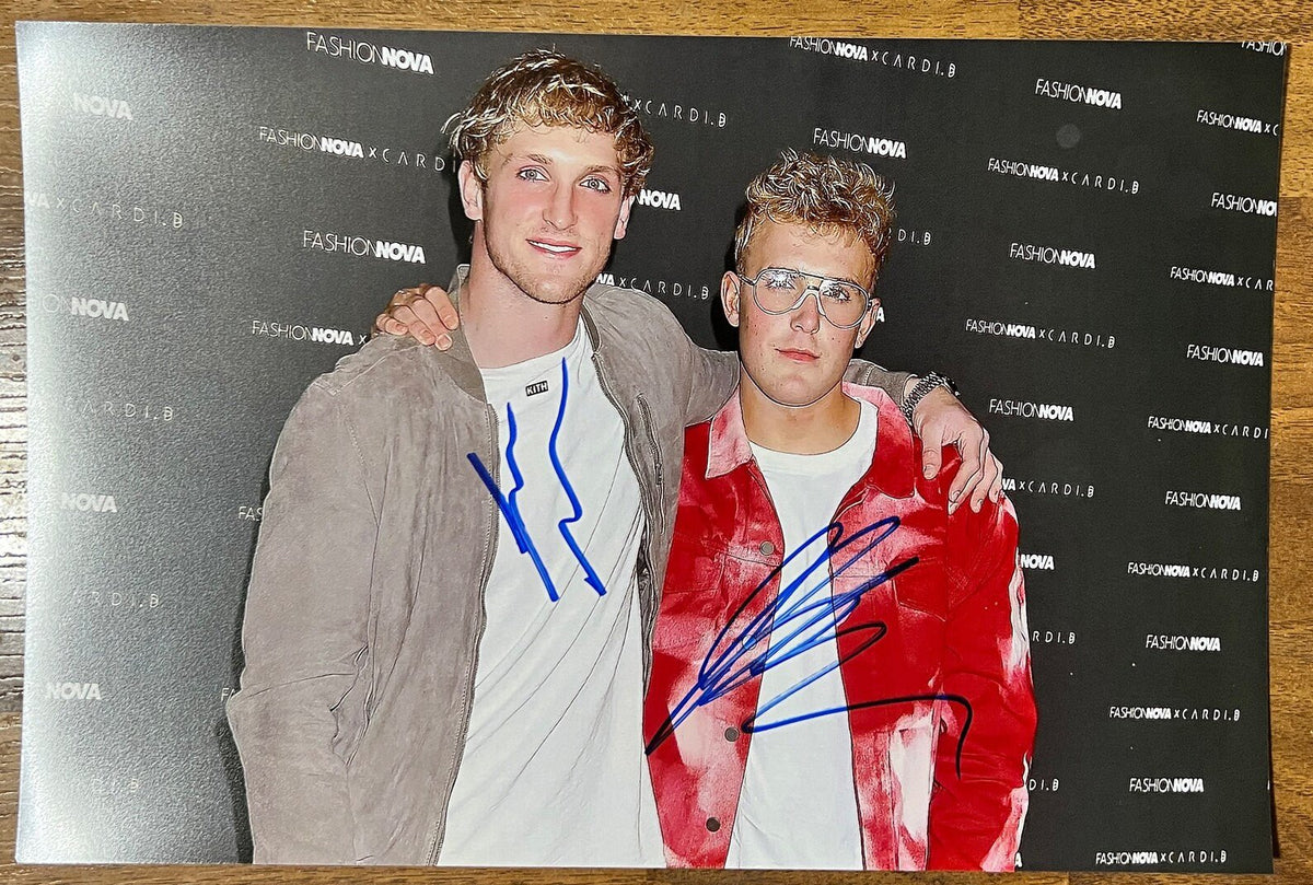 An autographed photo poster print of brothers Jake and Logan Paul. Signed poster by both in blue ink signatures. photograph Logan Paul Jake Paul autographs for sale on 8x12 inch picture.