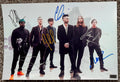 An autographed photo poster of the band Maroon 5. Signed poster by Adam Levine, Jesse Carmichael, James Valentine, Matt Flynn, PJ Morton and Sam Farrar in blue black gold and silver marker ink signatures. photograph Maroon 5 autographs for sale on 8x12 inch picture.