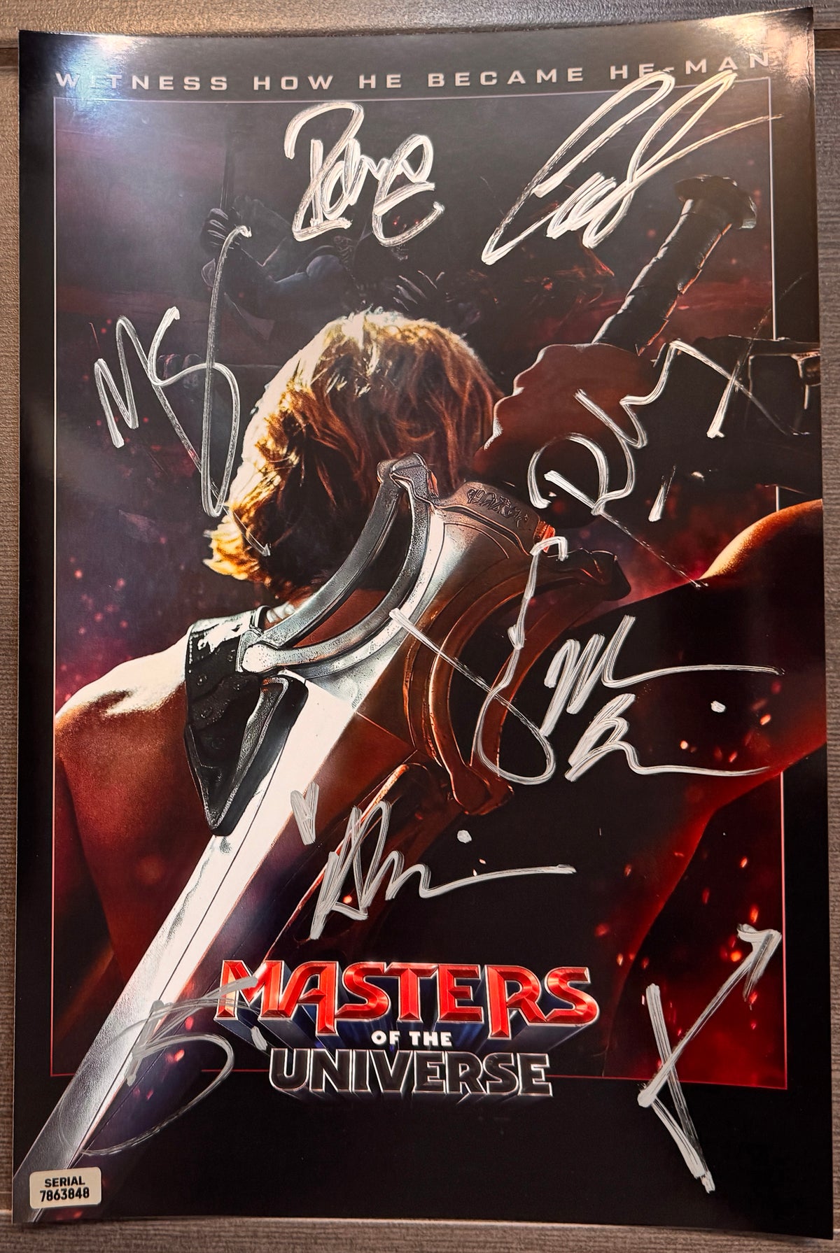 An autographed Masters of the Universe: The Movie poster. Signed photo of Nicholas Galitzine, Camila Mendes, Alison Brie, Morena Baccarin, James Purefoy, Idris Elba, Jared Leto, Kristen Wiig in silver ink marker signatures. Photograph autographs for sale on 8x12 inch picture.