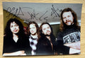 An autographed poster of heavy metal band, Metallica. Signed photo of James Hetfield, Kirk Hammett, Lars Ulrich and Jason Newsted in black ink marker signatures. Photograph autographs for sale on 8x12 inch picture.