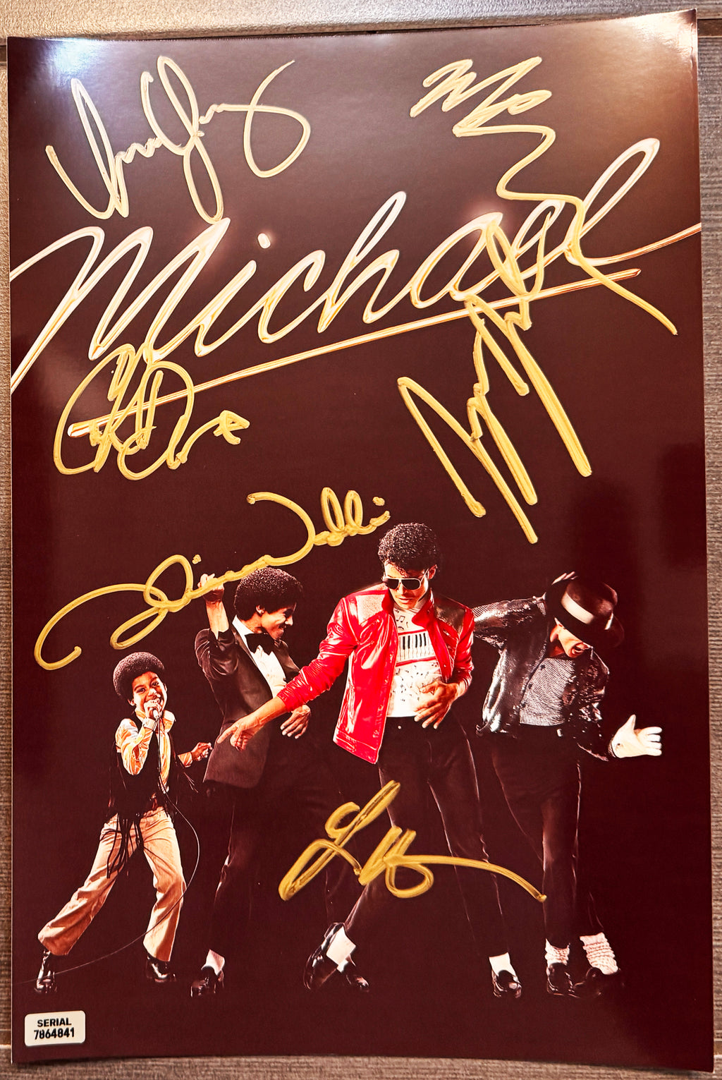 A cast autographed poster from the biopic movie, Michael. Signed photo of Jaafar Jackson, Nia Long, Laura Harrier, Juliano Valdi, Miles Teller and Colman Domingo in gold ink marker signatures. Photograph autographs for sale on 8x12 inch picture.