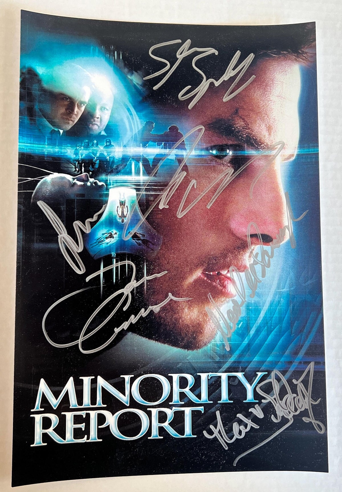 An autographed photo print of the movie Minority Report. Signed photo of Steven Spielberg, Tom Cruise, Max Von Sydow, Colin Farrell, Neal McDonough and Samantha Morton in silver ink signatures. Photograph autographs for sale on 8x12 inch picture.