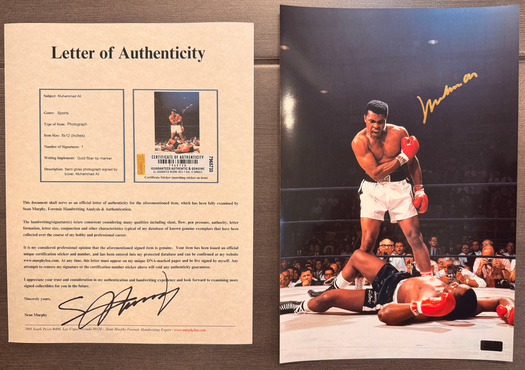 An autographed upper deck master collection auto photo poster of boxer, Muhammad Ali. Also known as Cassius Clay. Signed photograph in gold ink marker signatures. Photograph Muhammad Ali autographs for sale on 8x12 inch picture with COA.