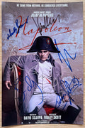 A cast signed autographed photo poster from the movie, Napolean. Signed photo of Joaquin Phoenix, Vanessa Kirby, Ben Miles, Ludivine Sagnier, Mark Bonnar and Tahar Rahim in silver black and blue ink markers signatures. photograph Napolean autographs for sale on 8x12 inch picture.