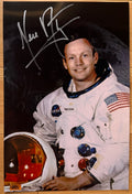 An autographed poster of NASA astronaut, Neil Armstrong. Signed photo of his Apollo 11 mission in silver ink marker signatures. Photograph autographs for sale on 8x12 inch picture.