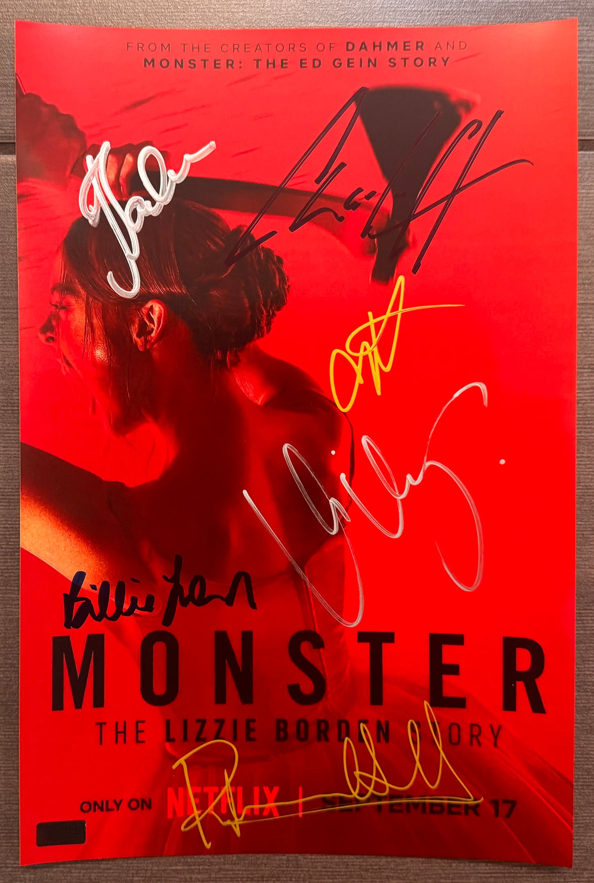 A cast autographed photo poster of the netflix series, MONSTER The Lizzie Borden Story. Signed photograph of Ella Beatty, Vicky Krieps, Charlie Hunnam, Rebecca Hall, Billie Lourd and Jessica Bardem in silver, blue, gold ink marker signatures. Photograph Monster The Lizzie Borden Story autographs for sale on 8x12 inch picture.