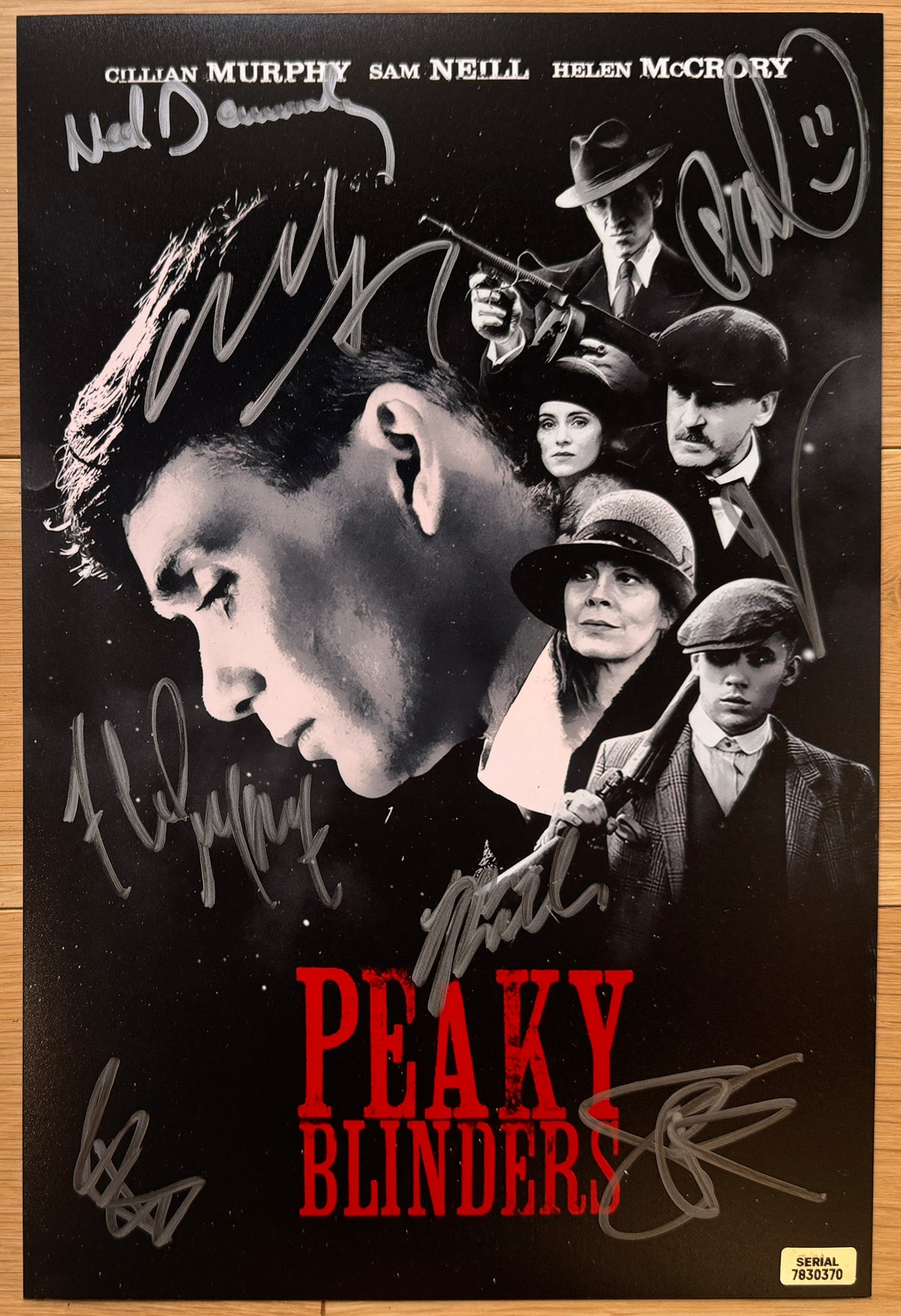 A cast autographed poster of the netflix television series Peaky Blinders. Signed photo of Cillian Murphy, Paul Anderson, Helen McCrory, Sophie Rundle, Ned Dennehy, Finn Cole, Ian Peck and Natasha O'Keeffe in silver ink marker signatures. Photograph autographs for sale on 8x12 inch picture.