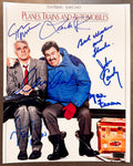 A cast autographed poster of the movie 'Planes, Trains and Automobiles'. Signed photo of John Candy, Steve Martin, Laila Robins, Dylan Baker, Martin Ferrero and Larry Hankin in blue ink markers signatures. Photograph autographs for sale on 8x12 inch picture.