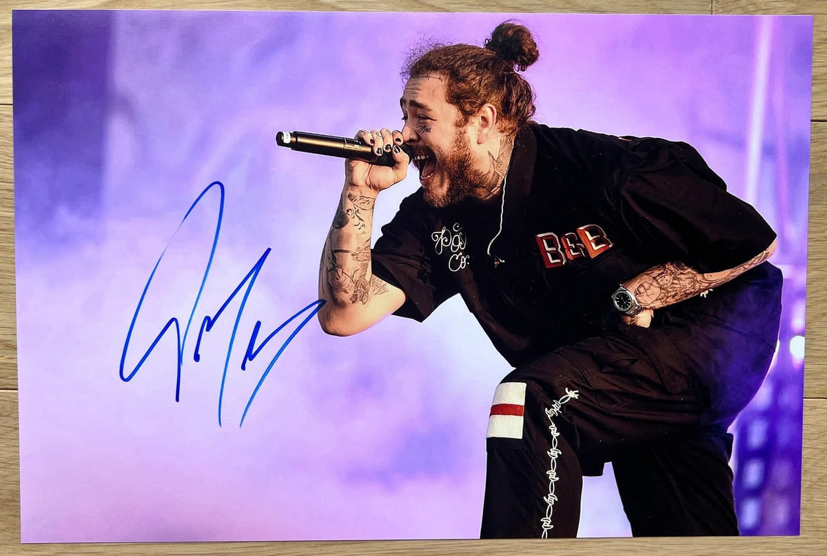 photograph signed by rapper and hip hop artist, Post Malone. autograph in blue ink on an 8x12 inch photograph. Post Malone autographs for sale.