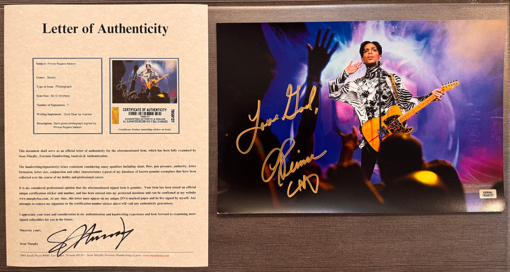 An autographed photo poster of pop star musician, Prince. Also known as Prince Rogers Nelson. Signed photo in gold ink marker signatures. Photograph Prince Rogers Nelson autographs for sale on an 8x12 inch picture with COA.