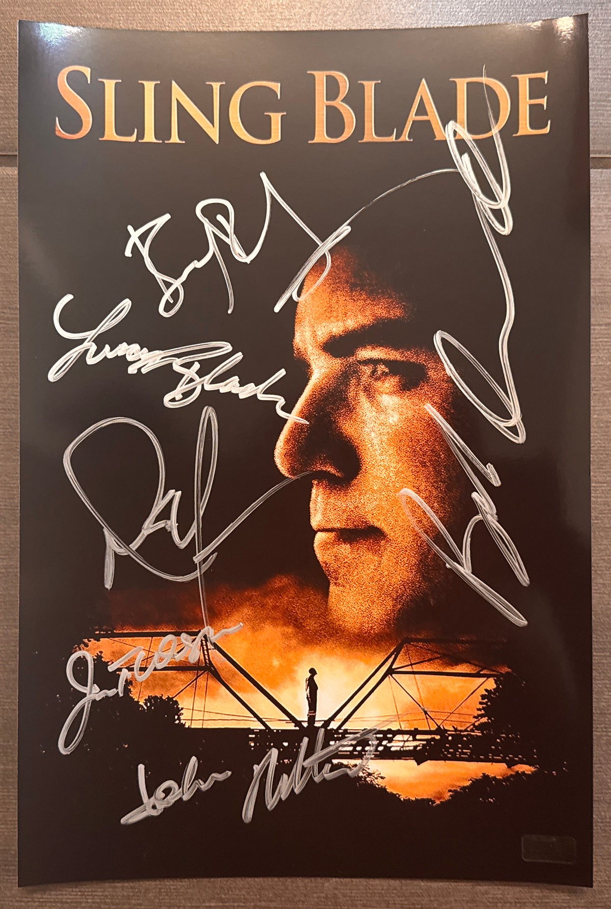 A cast autographed photo poster of the movie, Sling Blade also known as Slingblade. Signed photograph of Billy Bob Thornton, Dwight Yoakam, Robert Duvall, J.T. Walsh, John Ritter and Lucas Black in silver ink marker signatures. Photograph Sling Blade autographs for sale on 8x12 inch picture.
